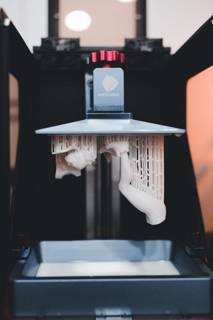 Crafting Captivating Headlines: Your awesome post title goes here High-quality close-up of a 3D printer printing an object with resin.